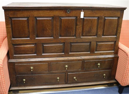 A mid 18th century oak mule chest W.150cm